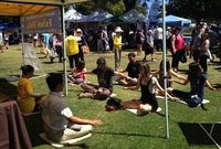 Learning the Falun Dafa exercises at San Diego Earth Day event in Balboa Park