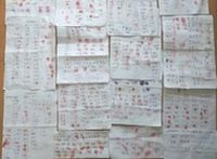 Thumbprints and signatures of petitioners calling for the prosecution of former Chinese leader Jiang Zemin