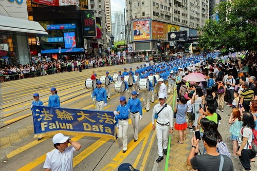 34f3fa91dd0c224c65ea878614d4d045 The grand march lasted three hours and wound through some of the busiest areas of Hong Kong
