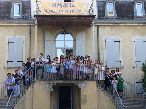 557b73cb846e7e20c44668023e6f6938 Young Falun Gong practitioners and their parents at the Minghui summer camp in Mane, Haute-Garonne