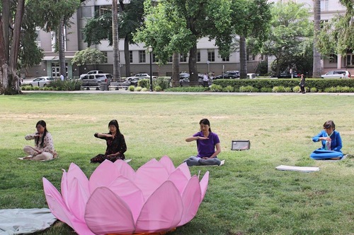 Group exercises by Falun Dafa practitioners in front of California State Capitol on June 7, 2017.