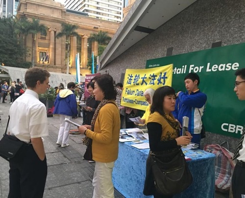 Falun Gong practitioners expose the CCP's persecution of Falun Gong at King George Square in Brisbane.