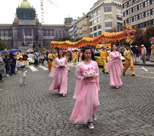 Dragon dance and dancing celestial maidens in the parade.