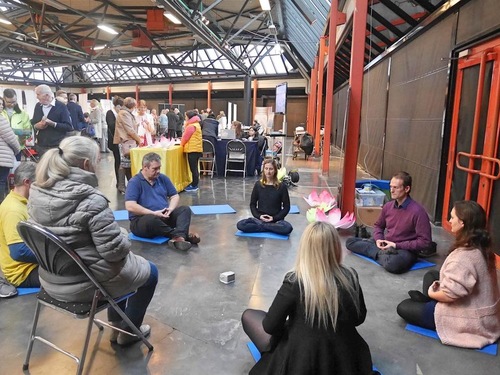 Falun Gong exercise instruction during the expo in Hasselt, Belgium.