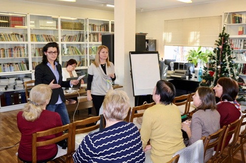 Practitioners present the ‘Petals of Peace’ project at an educational conference on December 27, 2017.