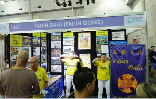 Falun Gong practitioners introduce the benefits of the mind and body practice to visitors at the annual Mind Body Spirit Festival in Brisbane.