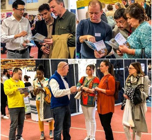 Practitioners introduce Falun Dafa to passersby.