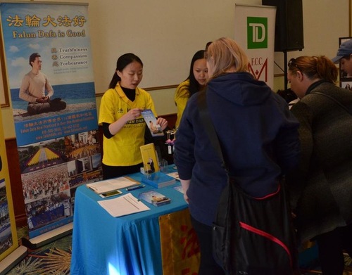 9f1411814bc25305bc01010b9b73318e Falun Gong practitioners introduce the practice to visitors at the 16th International Day for the Elimination of Racial Discrimination held by the York Regional Police at the Markham Event Centre, Markham, Ontario.