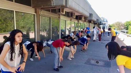 Bulgarians learning the Falun Dafa exercises at the Bulgarian Health Festival.