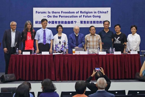 Legislators and experts at the forum in Hong Kong.
