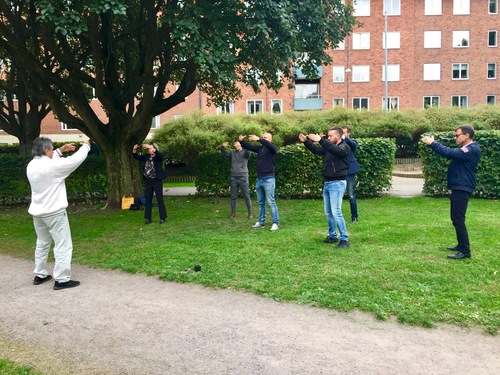BNI members in Linköping, Sweden learning the Falun Dafa exercises.