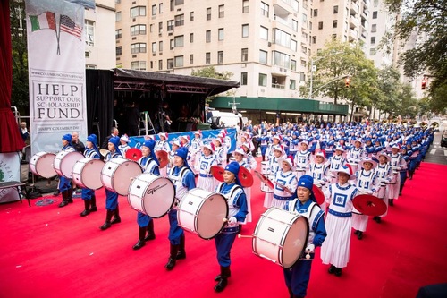 Members of the Tian Guo Marching Band perform on the red carpet between 67th and 69th streets on Fifth Avenue in Manhattan.
