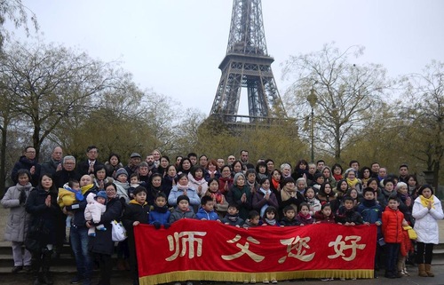 Practitioners gathered at the Eiffel Tower on December 16.