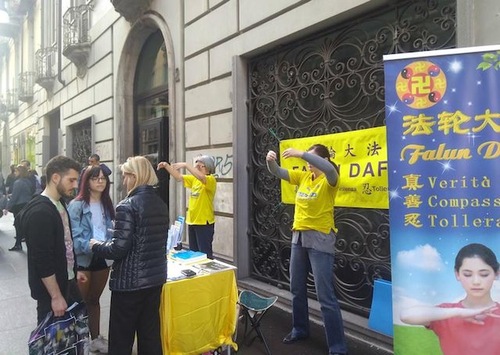 Falun Gong practitioners hold activities in downtown Turin, Italy.