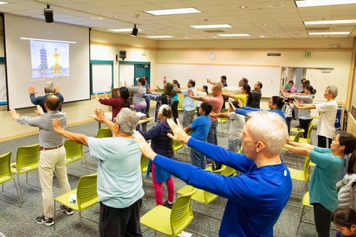 Learning the Falun Dafa exercises.