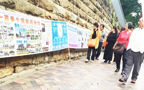 Falun Gong banners and display boards near the Sydney Opera House.