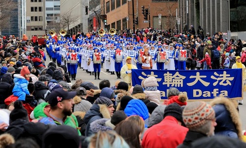 0646cc4edccb395f5115b1346d9379fe The Tian Guo Marching Band was warmly applauded during the Christmas parade in Montreal on November 23, 2019.