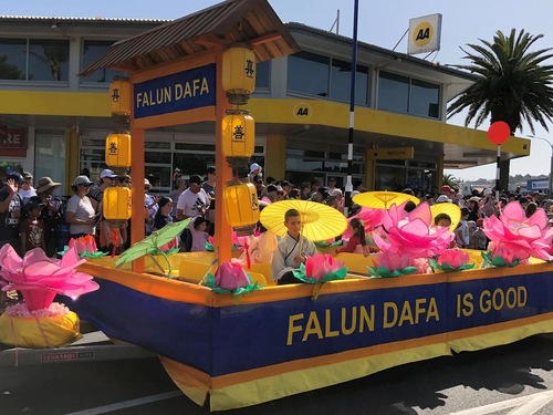 Practitioners participate in the Orewa Christmas parade.