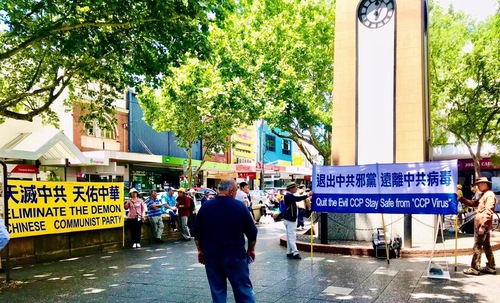 90115822fbb656f7b5732354f83e89dd Practitioners held banners and demonstrated the exercises during an event in Sydney on November 8, 2020.