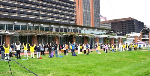 Practitioners demonstrate the exercises during activities held near the Liberty Bell on October 10, 2020.