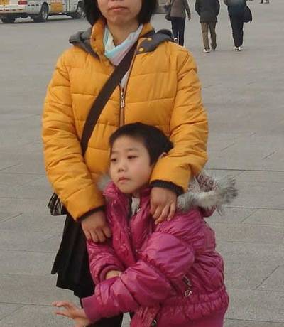Ms. Fu Yanfei and her son