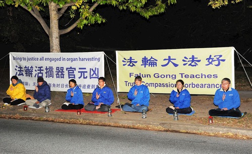 Practitioners held a candlelight vigil in front of the Chinese embassy in Canberra on April 23, 2020.