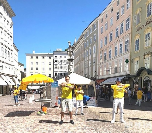 Practitioners promote Falun Gong and raise awareness of the persecution in China in Salzburg on August 7, 2021
