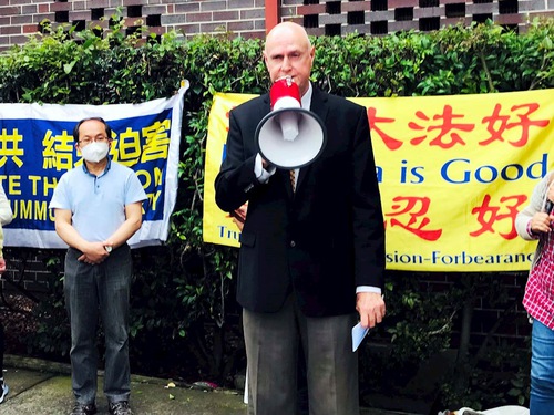 John Deller, spokesperson for the Falun Dafa Association, spoke at the rally.