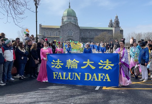 Practitioners participate in St. Patrick’s Day Parade.