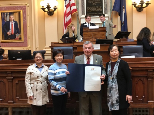 Virginia General Assembly Delegate John Avoli (second from right) presented House Resolution No. 9 to Falun Gong practitioners at the Virginia General Assembly on March 8, 2022.