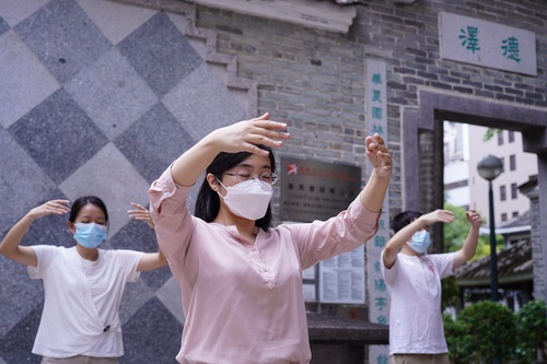 Practitioners in Hong Kong practice the Falun Dafa exercises in a local park.