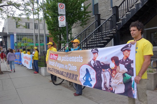 Practitioners displayed large banners along Mount Royal Avenue in Montreal.