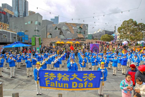 Tian Guo Marching Band performs during the rally in Melbourne on July 9.