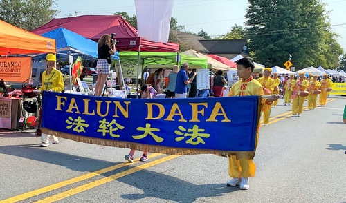 Falun Gong practitioners participate in the annual Poolesville Day parade on September 17.