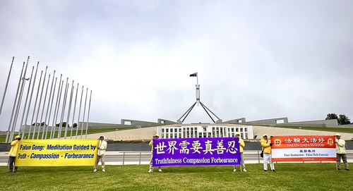 Practitioners and human rights advocates held a rally in front of Parliament House in Canberra on November 22.
