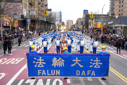Practitioners took part in the parade to usher in the Year of the Rabbit hoping to bring joyous spirits and good tidings to people.