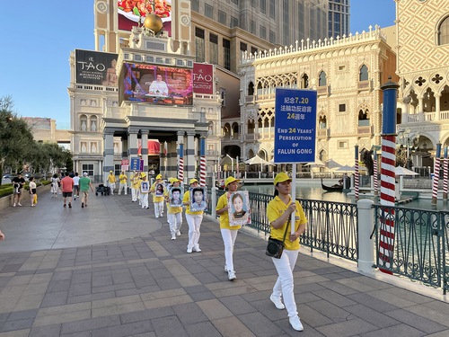 Practitioners marched along Las Vegas Boulevard on July 9, 2023 to raise awareness of the persecution in China.
