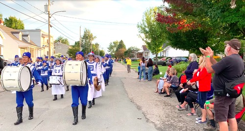 The Tian Guo Marching Band led the procession and was well received by locals.