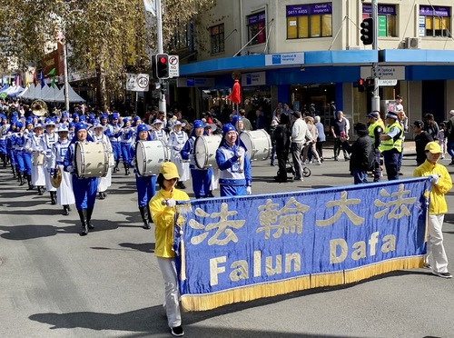 The Tian Guo Marching Band, made up of Falun Gong practitioners, participated in the StreetFair parade on September 2, 2023.