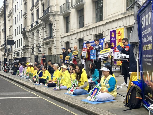 Falun Dafa practitioners peacefully protest in front of the Chinese Embassy in London on October 1, 2023.