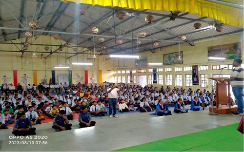 A practitioner explains the exercise movements at Jawahar Navodaya High School in Wardha on August 10.