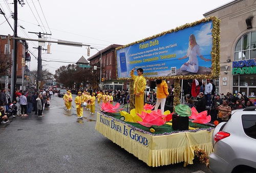 Practitioners demonstrate the exercises on a float.