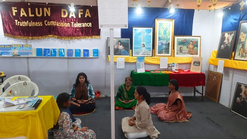 A group of young adults followed a practitioner in practicing the meditation.