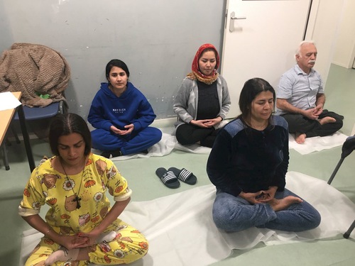 Refugees learning the Falun Gong exercises in Ter Apel camp