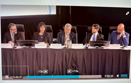 Video screenshot of a hearing during a public inquiry into foreign interference in Ottawa held on March 27, 2024. Ms. Dai (second on left), president of the Falun Dafa Association in Canada, and Mehmet Tohti (centre), executive director of the Uyghur Rights Advocacy Project (URAP), testified to the CCP’s interference in Canada during the hearing.