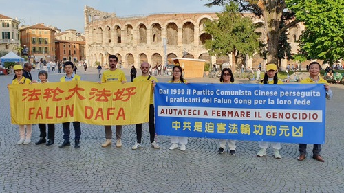 Practitioners displayed banners during the event at Piazza Bra in Verona’s Old Town on April 11, 2024