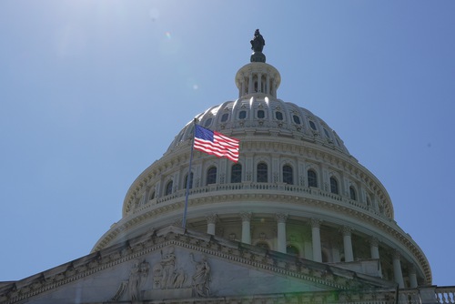 Flag-raising at the U.S. Capitol on May 13 to thank Master Li.