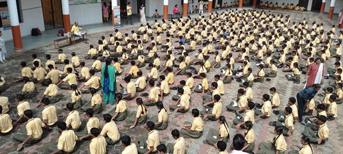 Students do the sitting meditation.